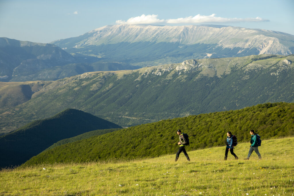 Rewilding Apennines Team leader, Mario Cipollone, and Communications Officer, Angela Tavone, monitoring wildlife together with Mount Genzana Nature Reserve Field Officer, Antonio Monaco. Central Apennines, Italy. 2020